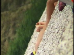 Nudist beach voyeur vid with two gorgeous brunettes all naked