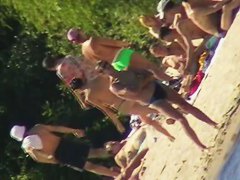 Cute brunette with black thong in the beach video