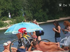 Mature fems get their nudist bodies spied by beach hunter