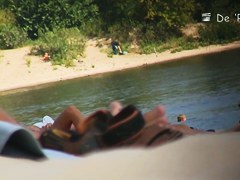 Mature fems get their nudist bodies spied by beach hunter