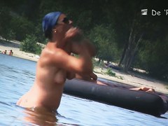 Mature fems get their nudist bodies spied by beach hunter