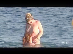 TWO TOPLESS LESBIANS AT A GREEK BEACH !!!