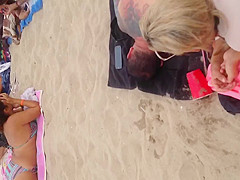 Pink thong on beach