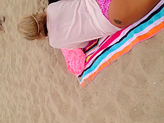 Pink thong on beach