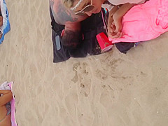 Pink thong on beach