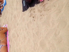 Pink thong on beach
