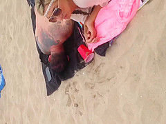 Pink thong on beach