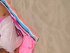 Pink thong on beach