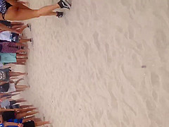 Walking with thong on beach