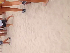 Walking with thong on beach