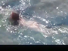 Naked woman sunbathes her nice body