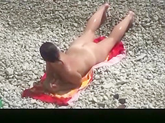 Nudist woman refreshing in the water