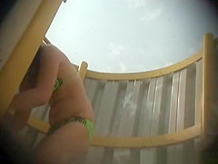 Teen changing her bikini for clothes