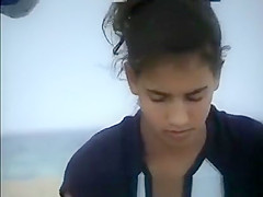 changing at beach topless