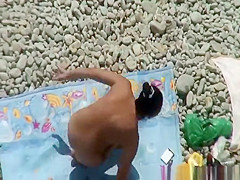 Nude woman takes pictures of her naked man