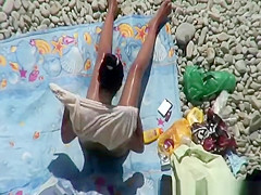 Nude woman takes pictures of her naked man