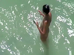 Nude woman takes pictures of her naked man