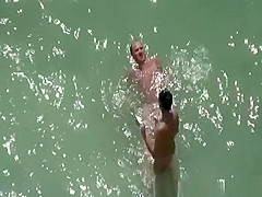 Nude woman takes pictures of her naked man