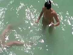 Nude woman takes pictures of her naked man