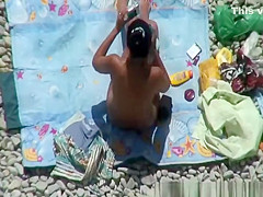 Nude woman takes pictures of her naked man