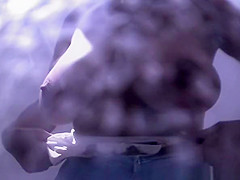 Big tits woman spied in beach cabin