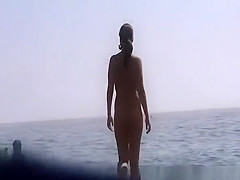 Nudist woman with small bush pussy