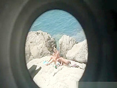 Nudist couple in the rocks