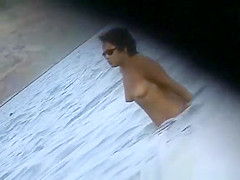 Chubby woman and small tits nudists