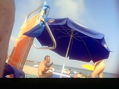 Voyeur films woman taking off her dress