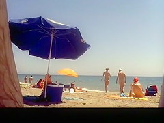 Voyeur films woman taking off her dress