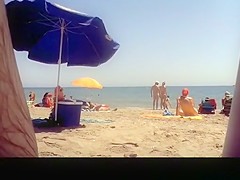Voyeur films woman taking off her dress