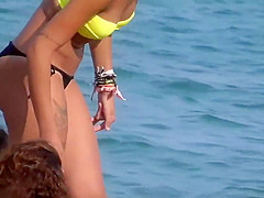 Bubbly butt cheeks falling out of bikini