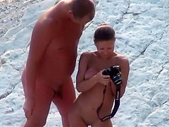 Fat hubby and fit wife on the beach