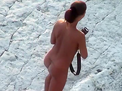 Fat hubby and fit wife on the beach