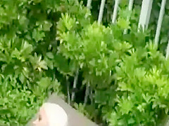 Zooming on a super sexy girl at the pool