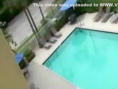 Zooming on a super sexy girl at the pool