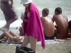 Nude teenage girl wrapped in a towel