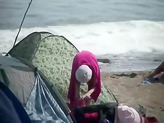 Nude teenage girl wrapped in a towel