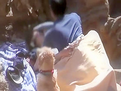 Shy couple fucking on a beach