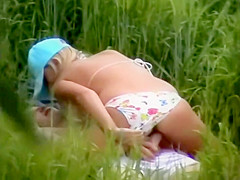 Naked goldilocks spied on the beach