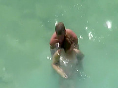 Sex in the water got caught by a voyeur