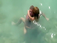 Sex in the water got caught by a voyeur