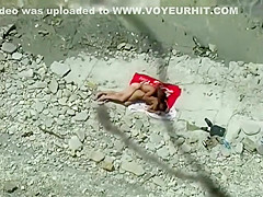 Couple making love at a beach