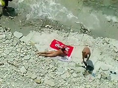 Couple making love at a beach
