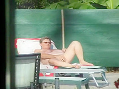 Milf thinks she's all alone at a pool