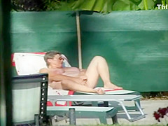 Milf thinks she's all alone at a pool