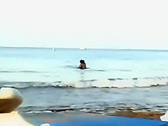 Wild fuck in the water caught by a voyeur