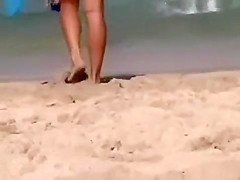 Super sexy babe plays with a racket