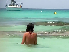 Topless sisters spied on an air mattress
