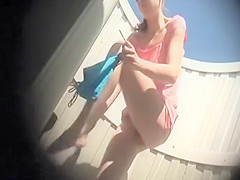 Sexy woman changing for the beach